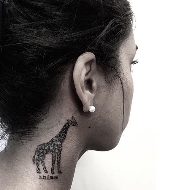 Cool Black Ink Giraffe Tattoo On Girl Right Side Neck