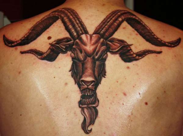 Cool Black Ink Goat Head Tattoo On Man Upper Back