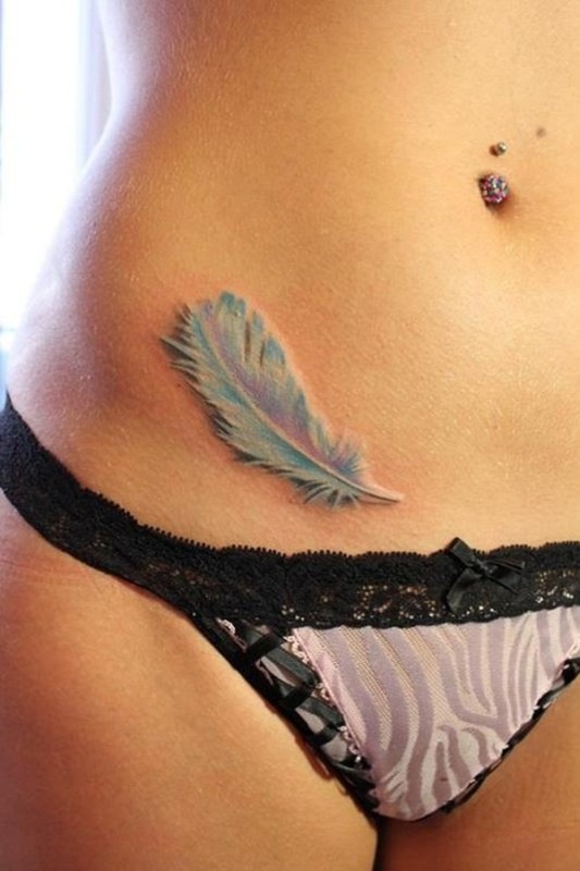 Cool Feather Tattoo On Girl Waist