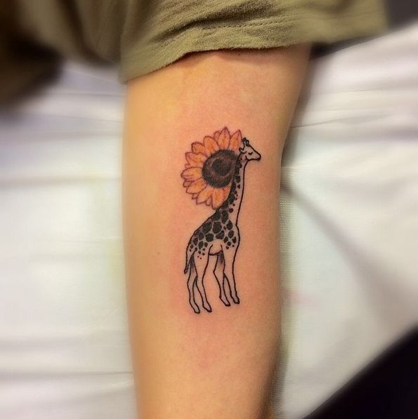 Cool Giraffe With Flower Tattoo On Half Sleeve