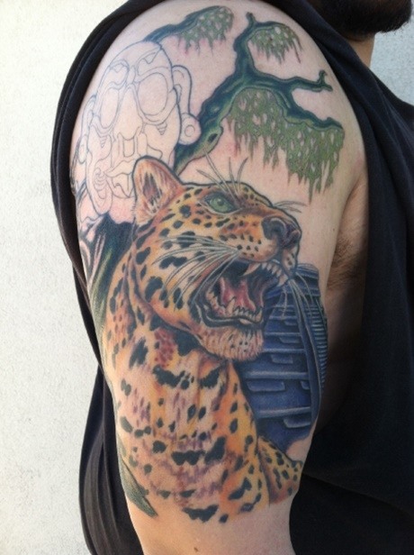 Cool Jaguar Tattoo On Man Right Half Sleeve