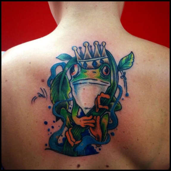 Crown On Frog Tattoo On Upper Back