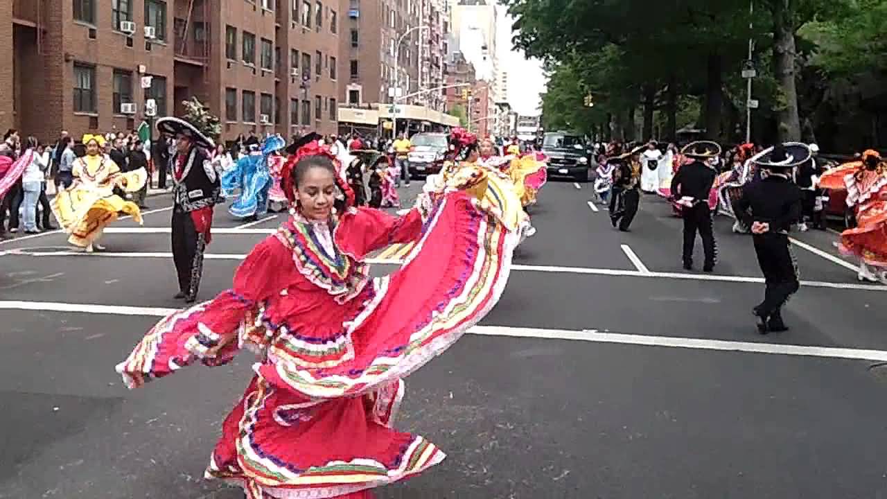 Girl In Pink Dress Dancing During Cinco De Mayo Parade