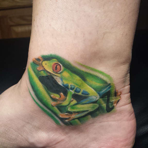 Green Ink Frog Tattoo Design For Wrist