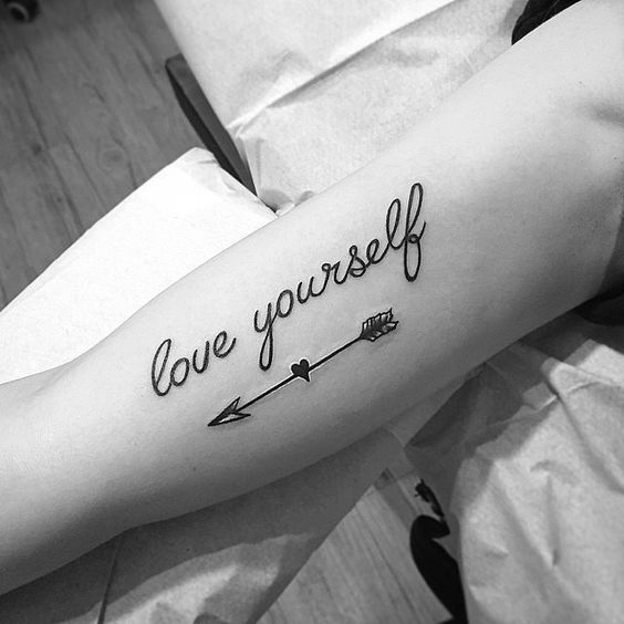Love Yourself – Black Ink Arrow Tattoo On Right Bicep