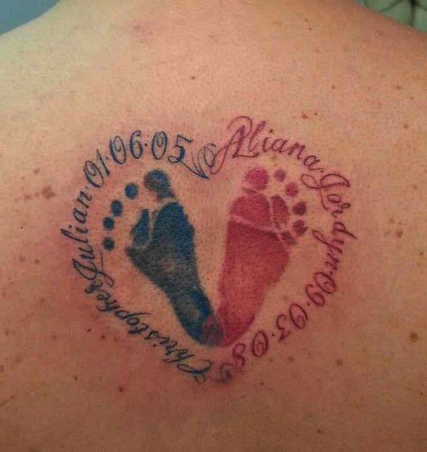 Memorial Footprints Tattoo On Upper Back