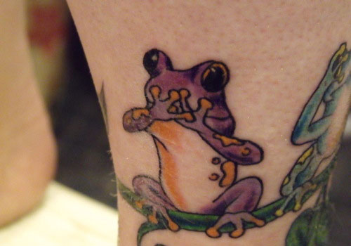 Purple Ink Frog Tattoo Design For Leg
