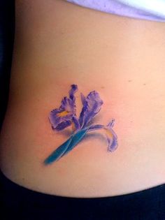 Purple Ink Iris Flower Tattoo On Left Side Rib