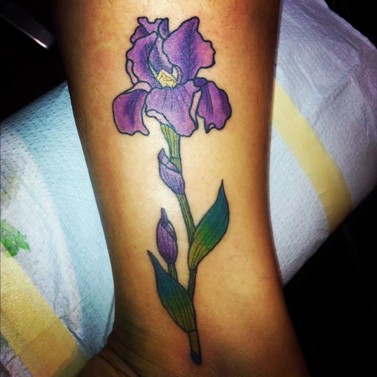 Purple Ink Iris Flower Tattoo On Leg