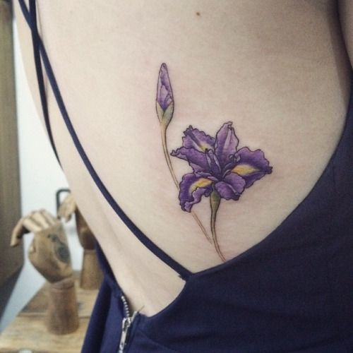 Purple Ink Iris Flower Tattoo On Right Side Rib