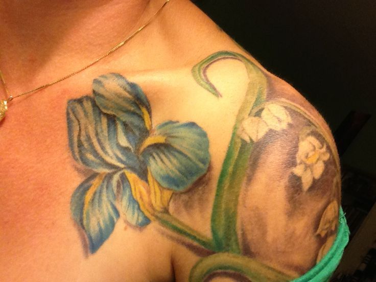 Realistic Iris Flower Tattoo On Left Front Shoulder