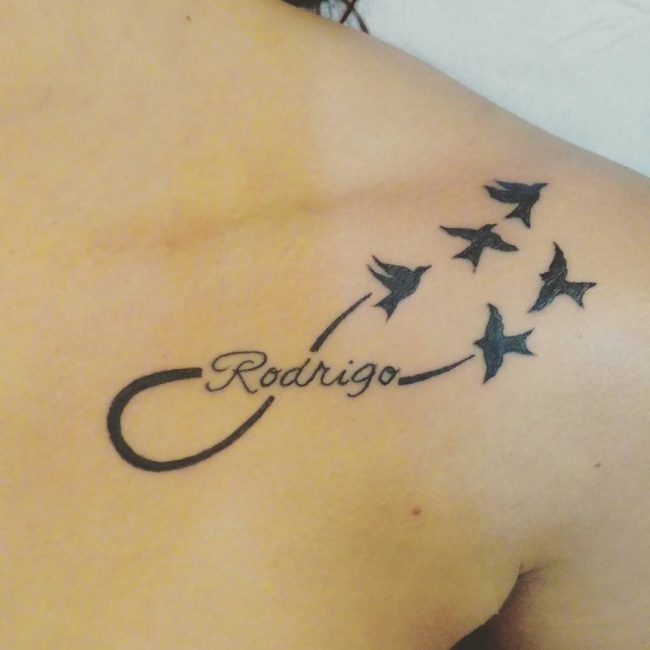 Rodrigo – Black Infinity With Flying Birds Tattoo On Left Front Shoulder