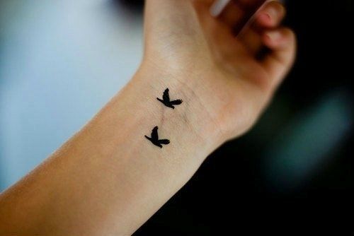 Silhouette Flying Birds Tattoo On Girl Left Wrist