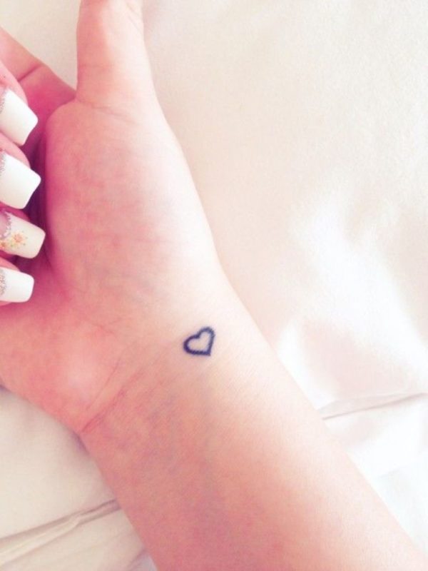 Simple Black Outline Heart Tattoo On Girl Right Wrist