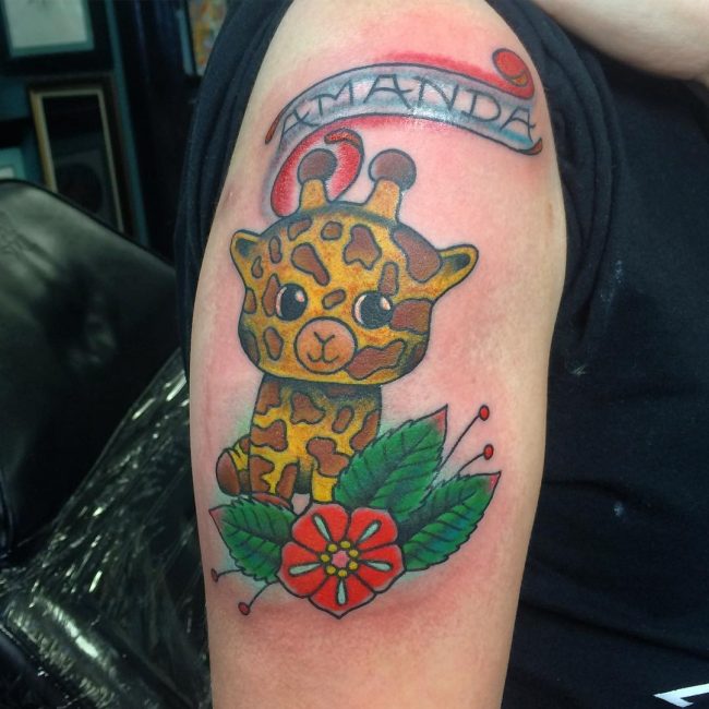 Traditional Baby Giraffe With Flower And Banner Tattoo On Right Half Sleeve