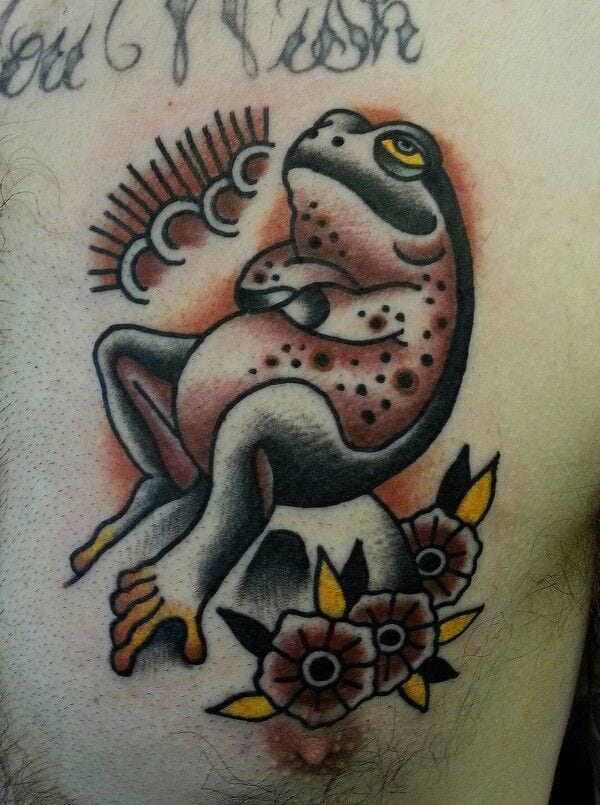 Traditional Frog With Flowers Tattoo Design