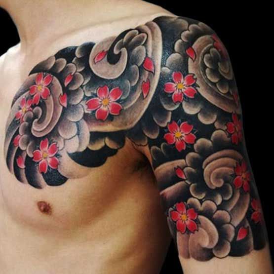 Traditional Japanese Flowers Tattoo On Man Left Shoulder
