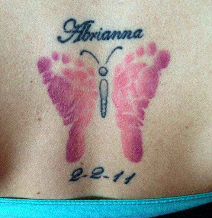 Unique Memorial Footprints Butterfly Wings Tattoo Design For Lower Back