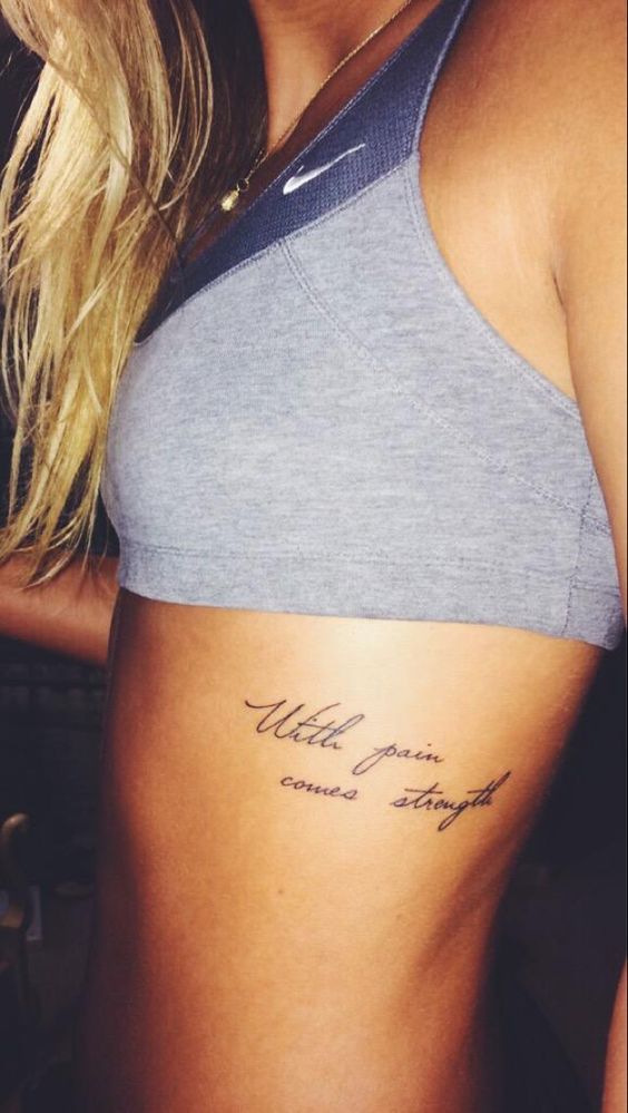 With Pain Comes Strongth Lettering Tattoo On Girl Left Side Rib