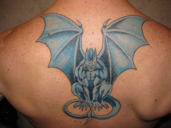 Wonderful Gargoyle Tattoo On Man Upper Back