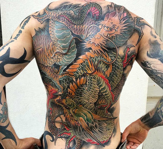 Amazing Colored Dragon Tattoo On Man Full Back