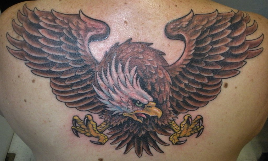 Amazing Flying Eagle Tattoo On Back by Pushinink