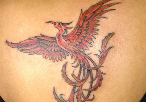 Amazing Flying Phoenix Tattoo Idea