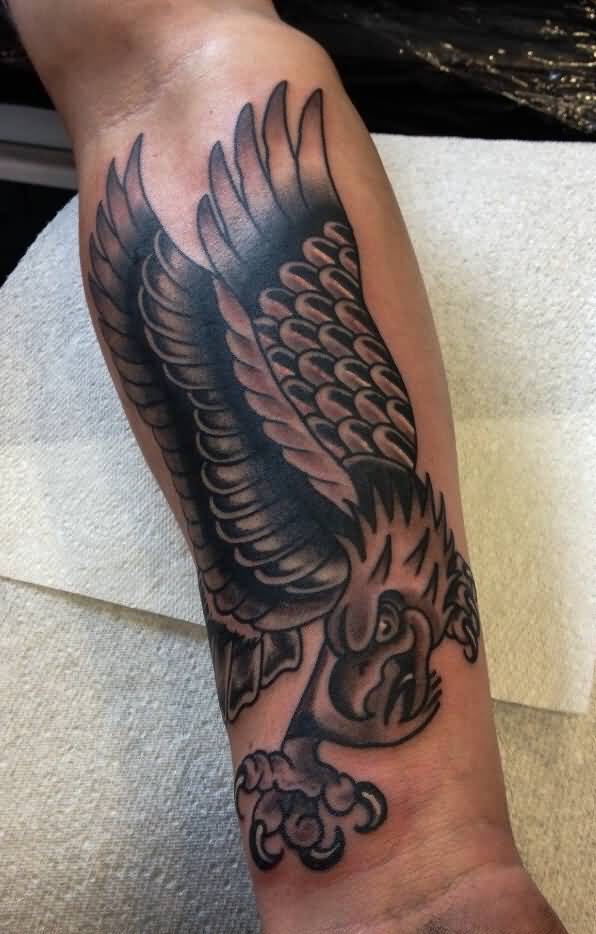 Amazing Grey And Black Flying Eagle Tattoo On Forearm