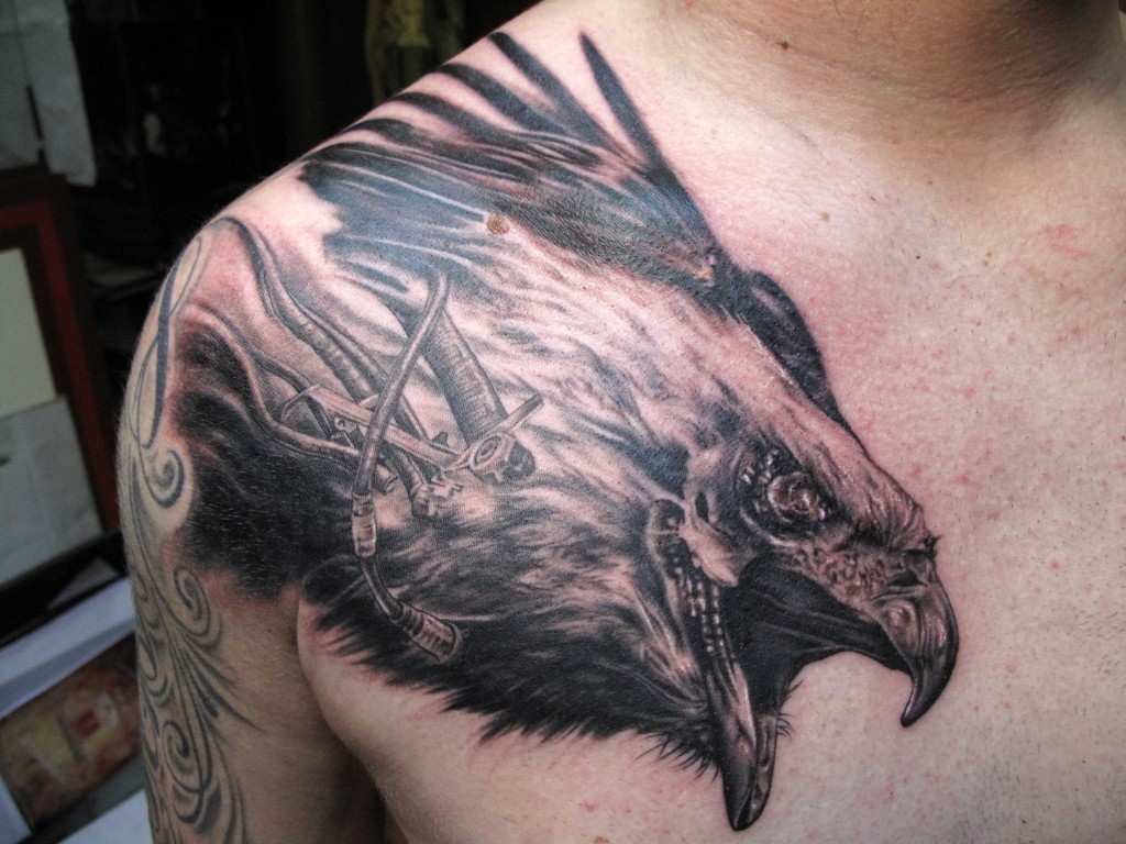 Angry Eagle Head Tattoo On Shoulder