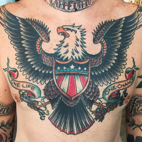 Awesome Colorful Eagle Crest Tattoo On Chest