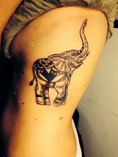 Black And Grey Traditional Elephant Tattoo On Girl Rib Side
