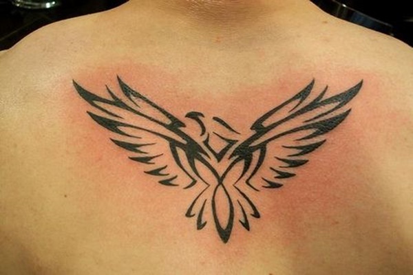 Black Tribal Flying Eagle Tattoo On Upper Back