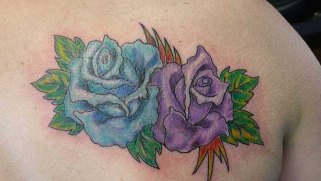 Blue And Purple Rose Flowers Tattoos On Back