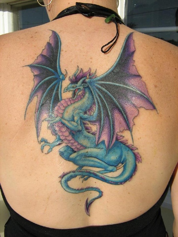 Blue and Purple Ink Dragon Tattoo On Girl Upper Back