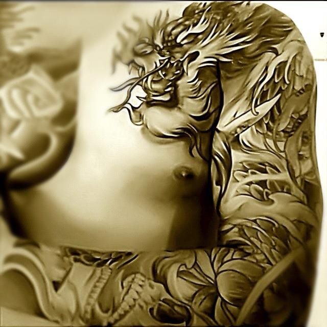 Chinese Dragon Tattoo On Man Chest To Sleeve