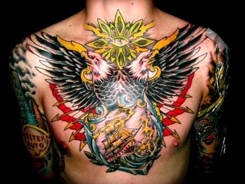 Colored ship And Flying Eagle Tattoo On Man Chest