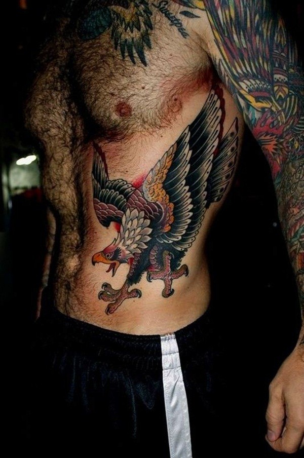 Colorful Eagle Tattoo On Man Left Rib Side