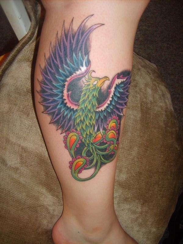 Colorful Flying Phoenix Tattoo On Side Leg