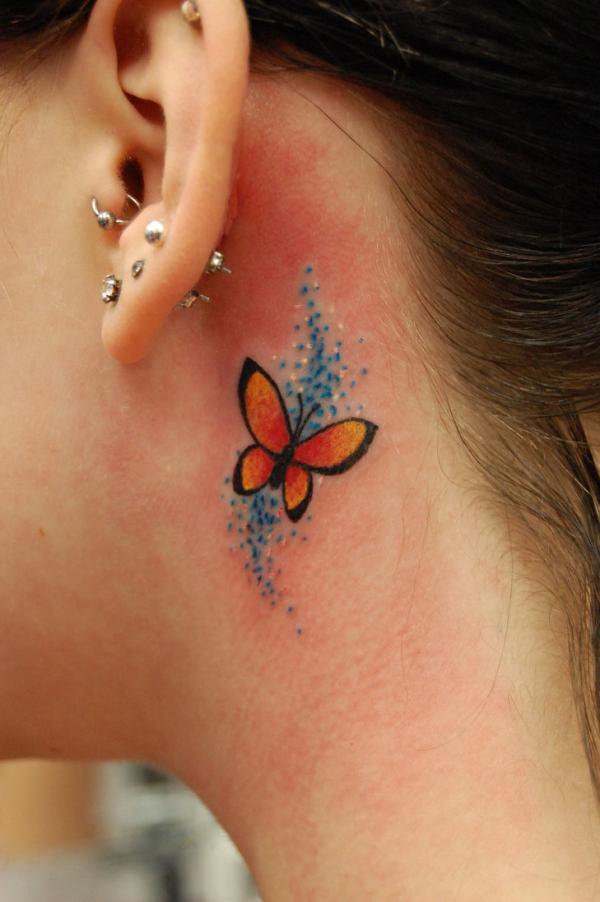 Cute Small Butterfly With Blue Swirls Tattooed on Side Neck by stuntmanmike666