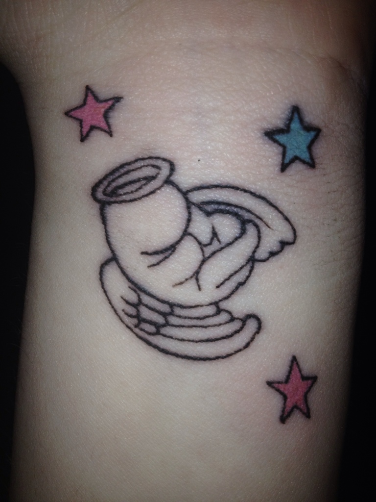 Cute small baby angel tattoo with stars