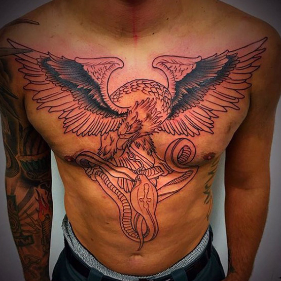 Eagle Flying With Snake Holding In Claws Tattoo On Man Chest