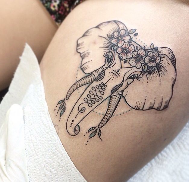 Elephant Head With Flowers Tattoo On Thigh