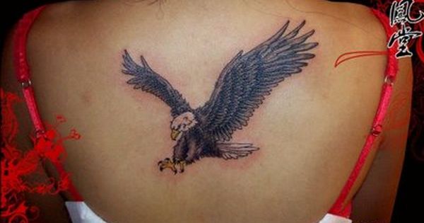 Flying Eagle Tattoo On Girl Upper Back