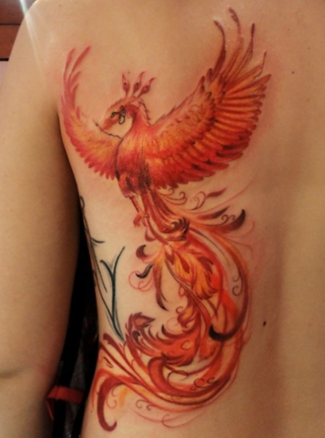 Flying Shining Phoenix Tattoo On Back Body
