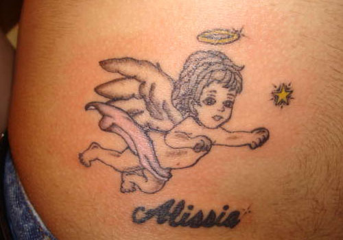 Flying baby angel with holy ring tattoo on lower back