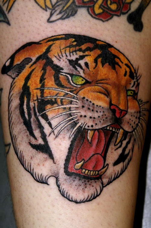 Green Eyes Angry Tiger Head Tattoo On Leg