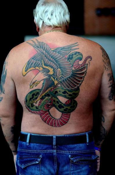 Green Ink Snake And Eagle Tattoo On Man Back by Colin Jones