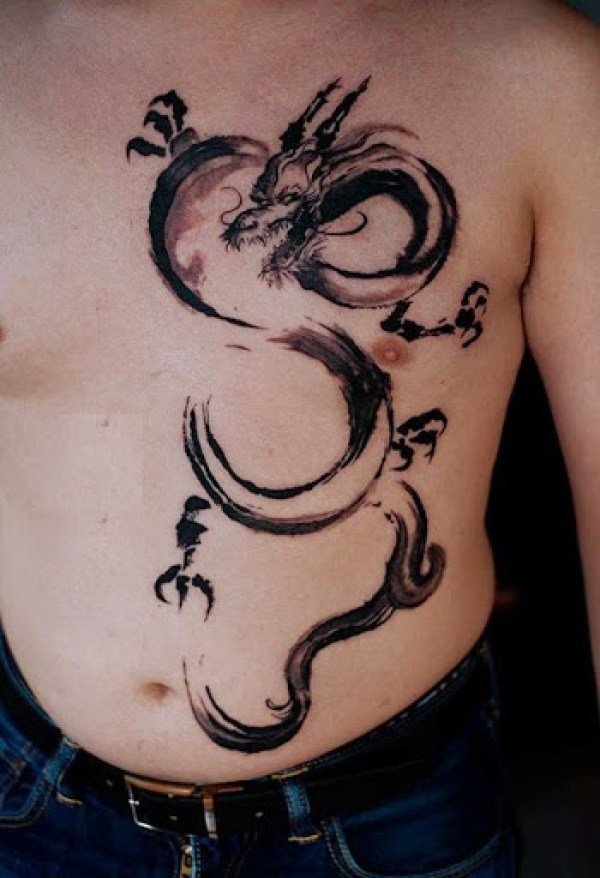 Grey And Black Dragon Tattoo On Man Chest