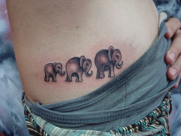 Grey Ink Elephant Family Tattooed On Side Rib
