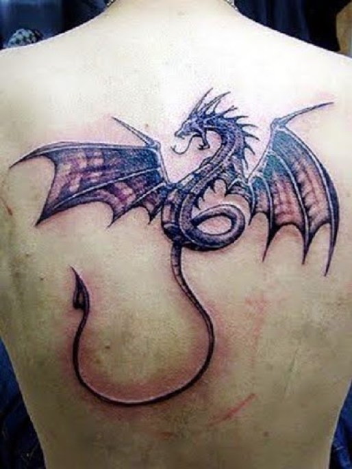 Grey Ink Flying Dragon Tattoo On Back Body